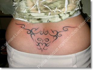 elegant-bas-dos-tattoo.jpg
