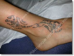 lezard-pied-cheville-tattoo.jpg